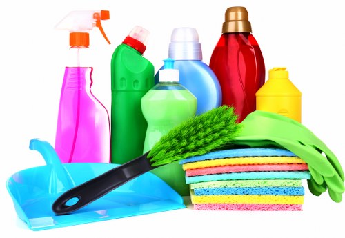 Cleaner preparing a living room in SW2