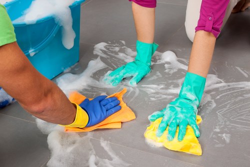 Office cleaning team working in a SW2 workspace