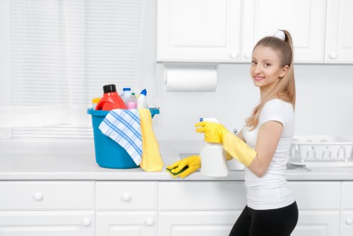 Carpet cleaning team working safely in SW2 with protective equipment