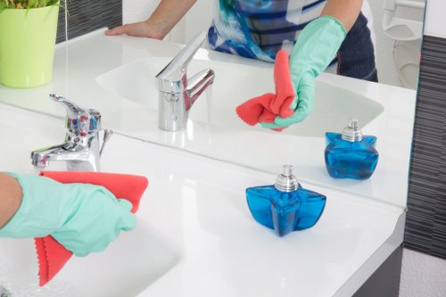 Professional cleaning of a kitchen during a move-out in SW2