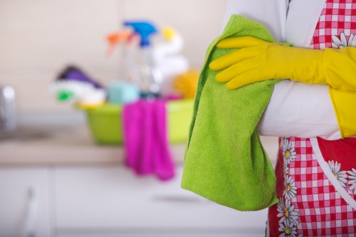 Local carpet cleaner treating stains and high-traffic areas