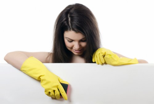 Cleaner using PPE during a carpet cleaning job in SW2